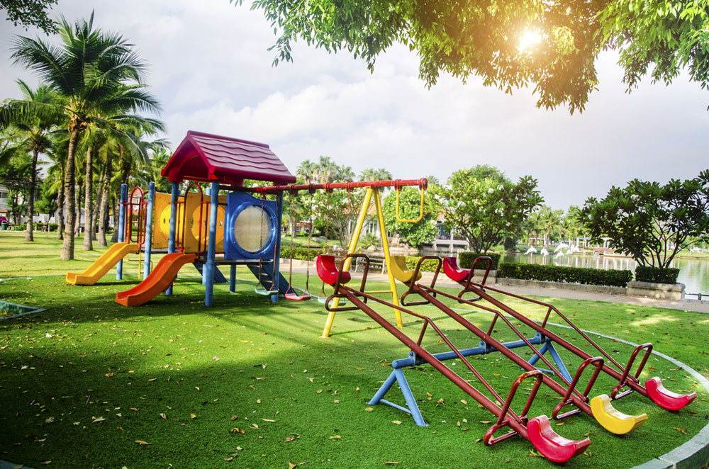 Artificial grass installation at a playground in Oklahoma
